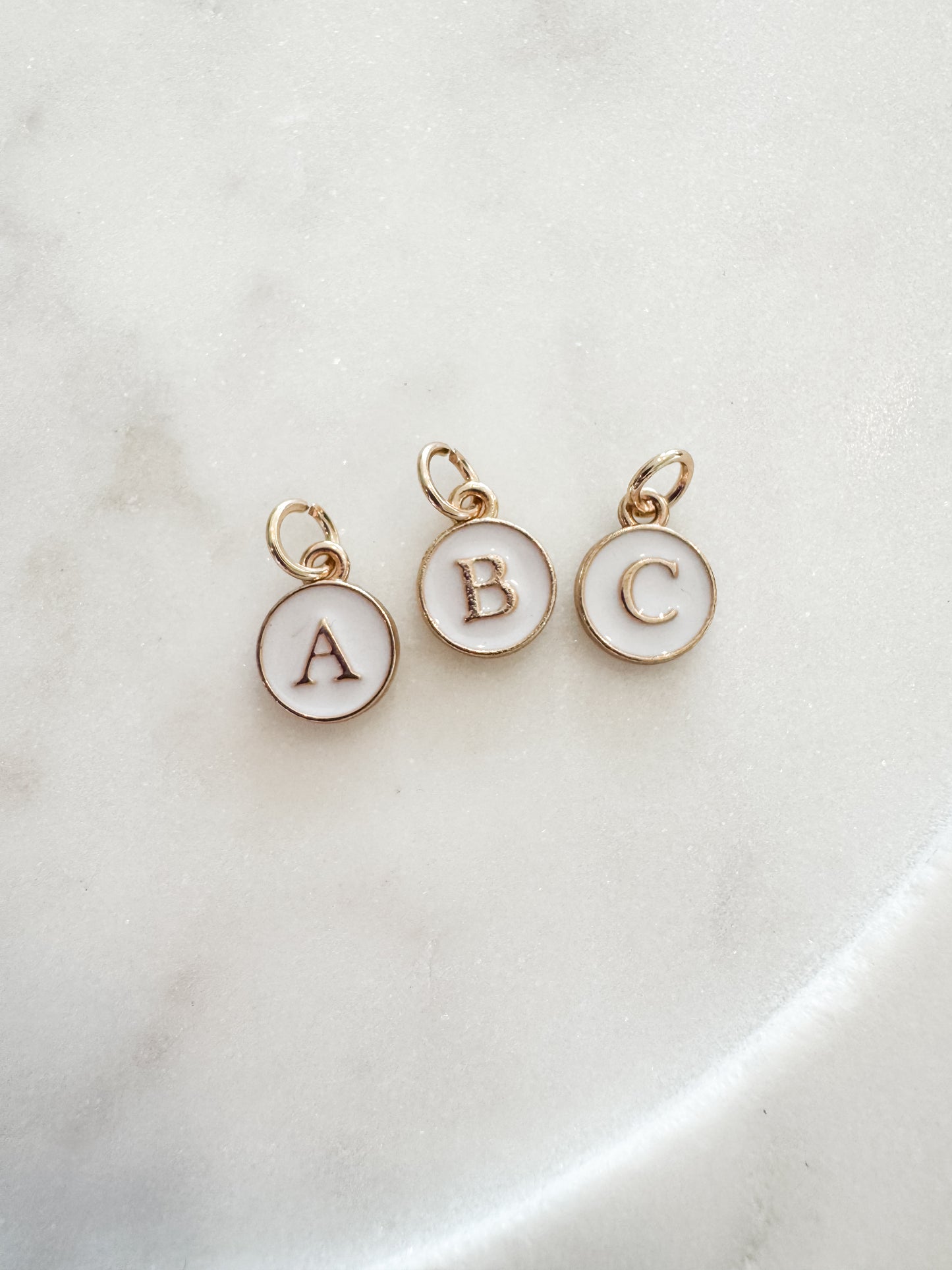 White Initial Charm